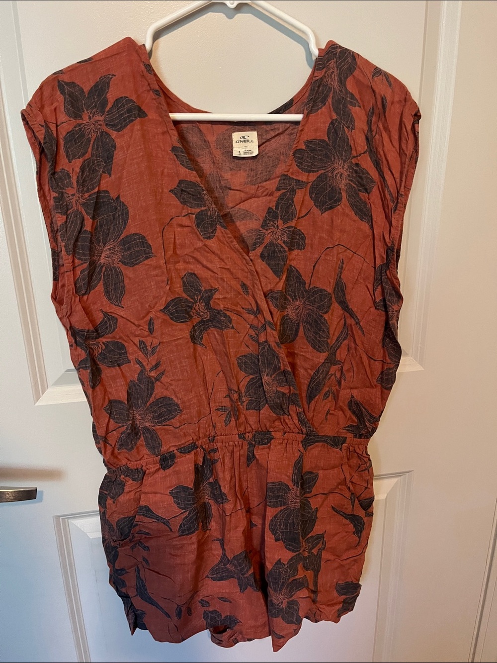 O'Neill Rust-Red Sleeveless Romper with Navy Leaf Print